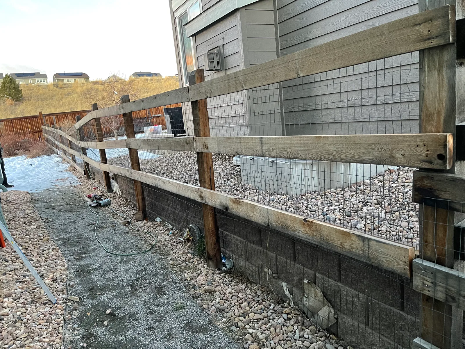 Block retaining wall and drainage work on a residential lot